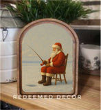 Arch Top Ice Fishing Santa Framed Art